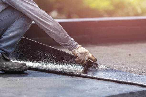 Professional Basement Waterproofing technician working in Uniontown, AL